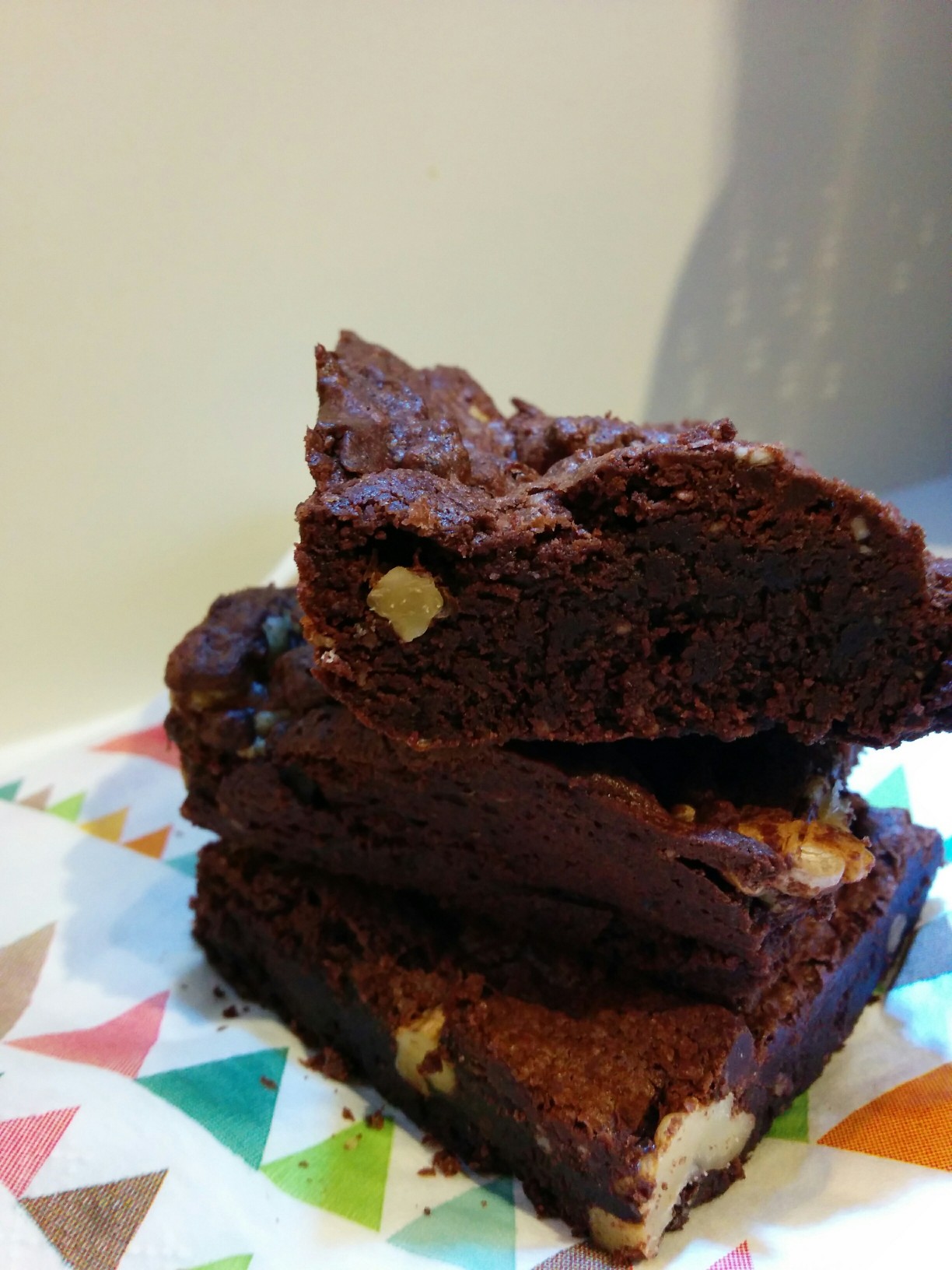 three brownies with walnut closeup